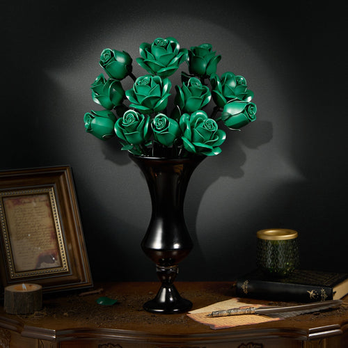 Green rose bouquet in a dark vase on an antique writing desk