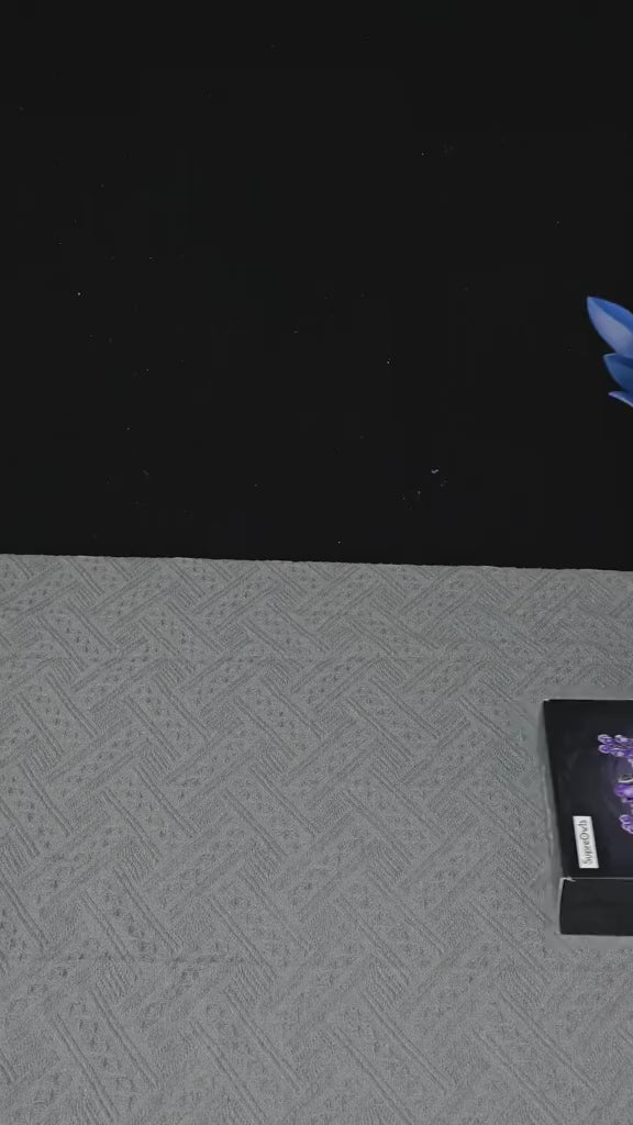 Video of the Purple Rose Bouquet Kit - twelve purple roses built by hand from 628 blocks, shown finished and in detail. Dark roses that never fade.