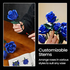 Hands arranging blue roses with customizable stems to fit any vase