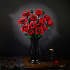 Red poppy bouquet in a black vase on an antique table against a dark background