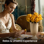 Woman following the illustrated guide while building yellow roses in a white vase